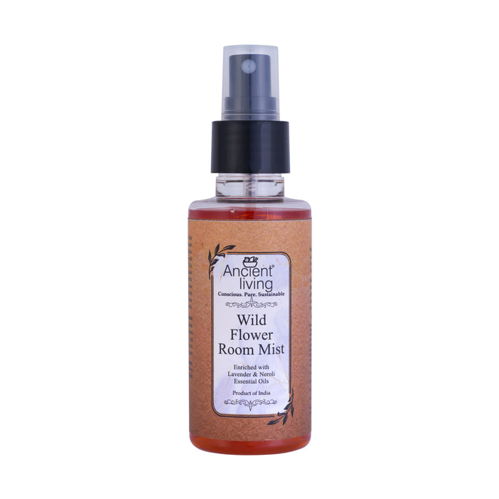 A spray bottle labeled 'Wild Flower Room Mist' with Ancient Living branding, indicating it is a blend of Lavender and Neroli essential oils.