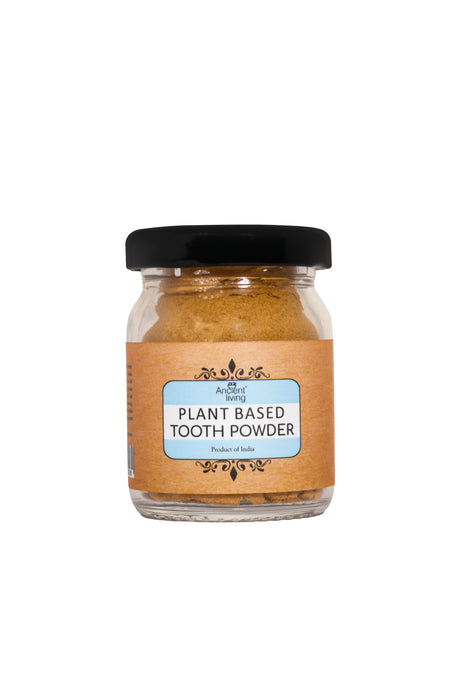 Jar of plant-based tooth powder with a label on a white background