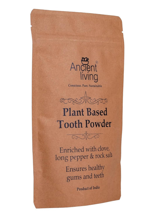 Brown package of Ancient Living plant-based tooth powder on a white background