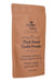 Brown package of Ancient Living plant-based tooth powder on a white background